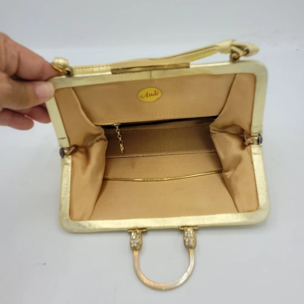 Vintage Andé Gold Clutch With Rhinestone Details Clasp.